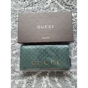 Gucci Leather Zip Around Micro Guccissima Wallet